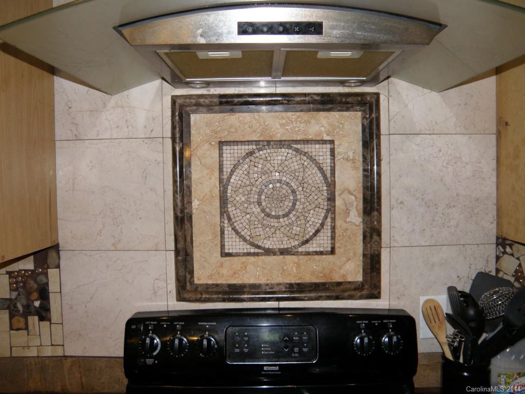 2300 Gooseberry Road Charlotte, NC 28208 - Photo 3 of 13 a close view of fireplace