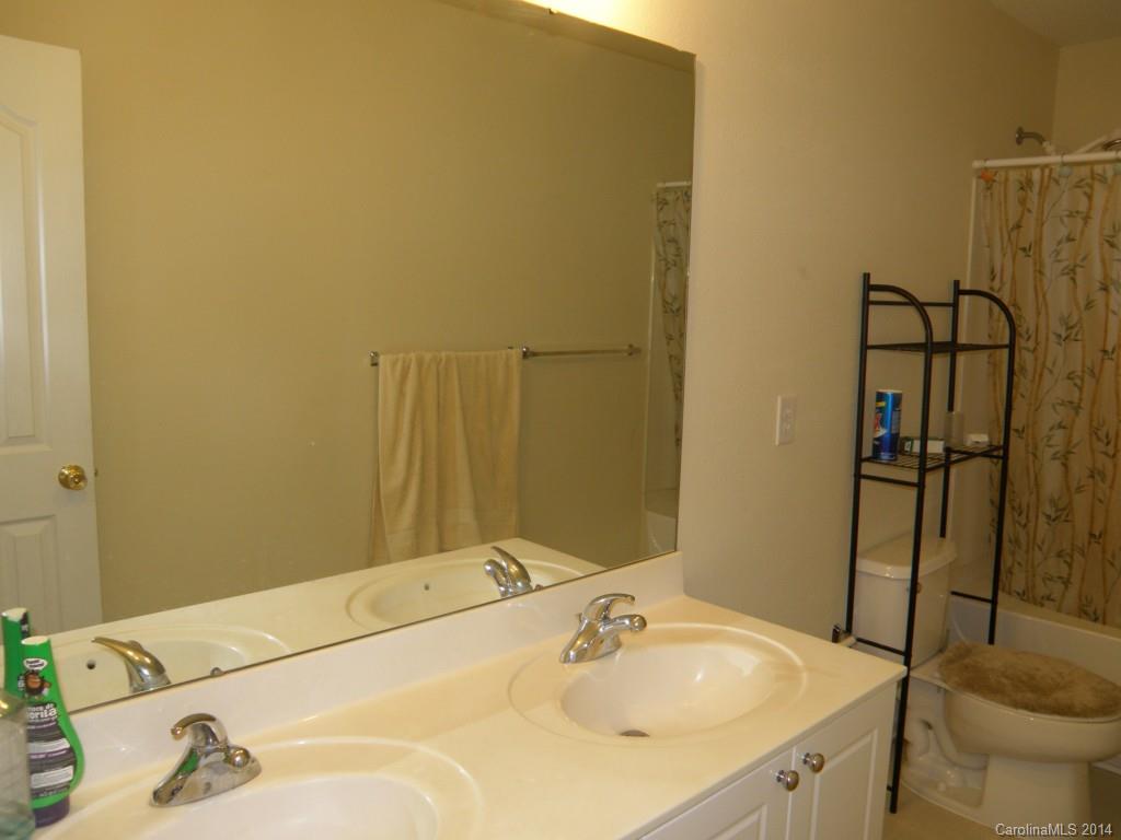 2300 Gooseberry Road Charlotte, NC 28208 - Photo 7 of 13 a bathroom with a sink and a tub