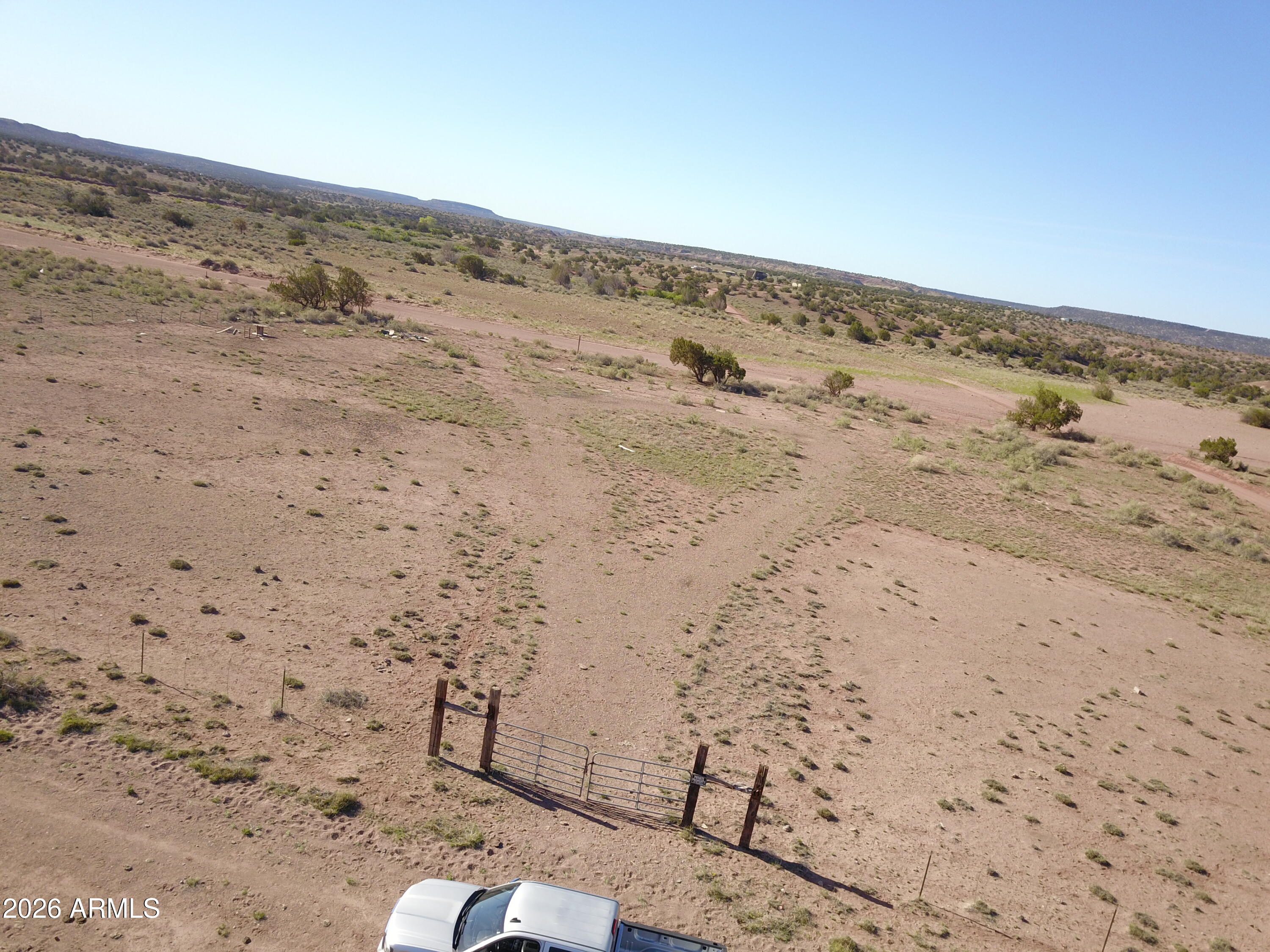 134 County Rd N6404, Unit 162 St. Johns, AZ 85936 - Photo 2 of 13 a view of wooden floor in middle of beach