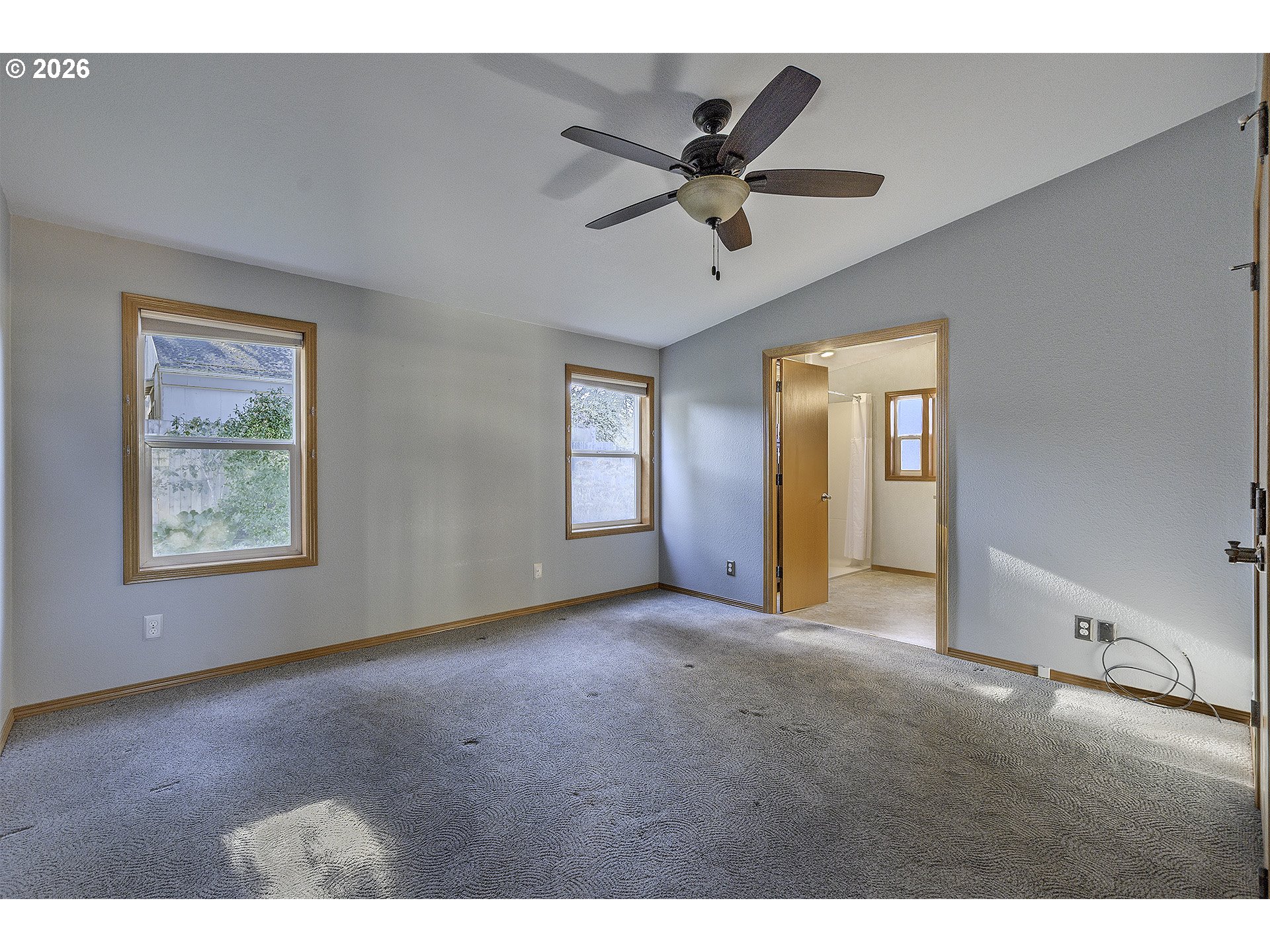 5385 Southwest 167th Avenue Beaverton, OR 97007 - Photo 9 of 29 a view of a livingroom with a ceiling fan and window