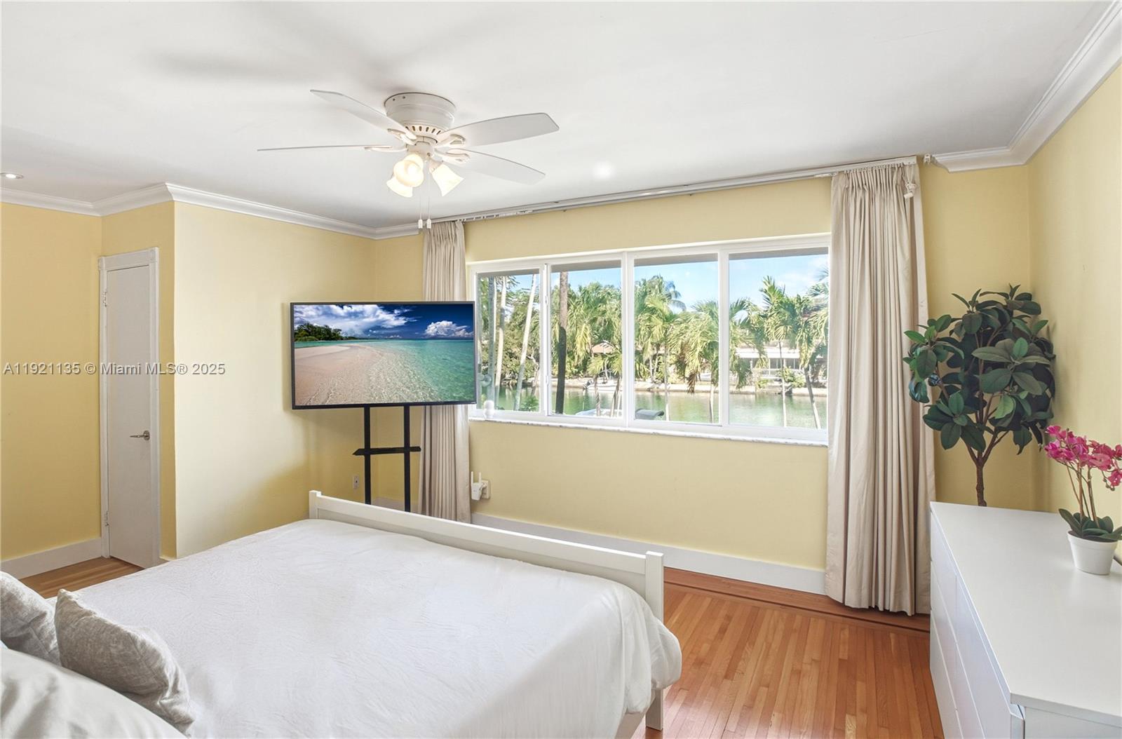 12545 Palm Road North Miami, FL 33181 - Photo 16 of 31 a bedroom with a bed and a window