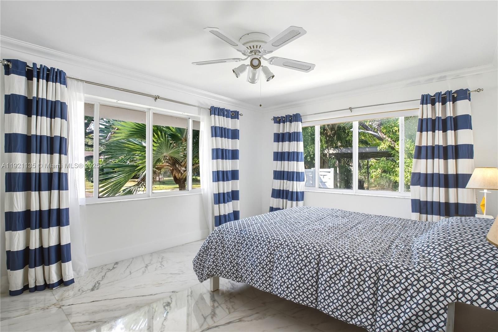 12545 Palm Road North Miami, FL 33181 - Photo 18 of 31 a bedroom with a bed and a window