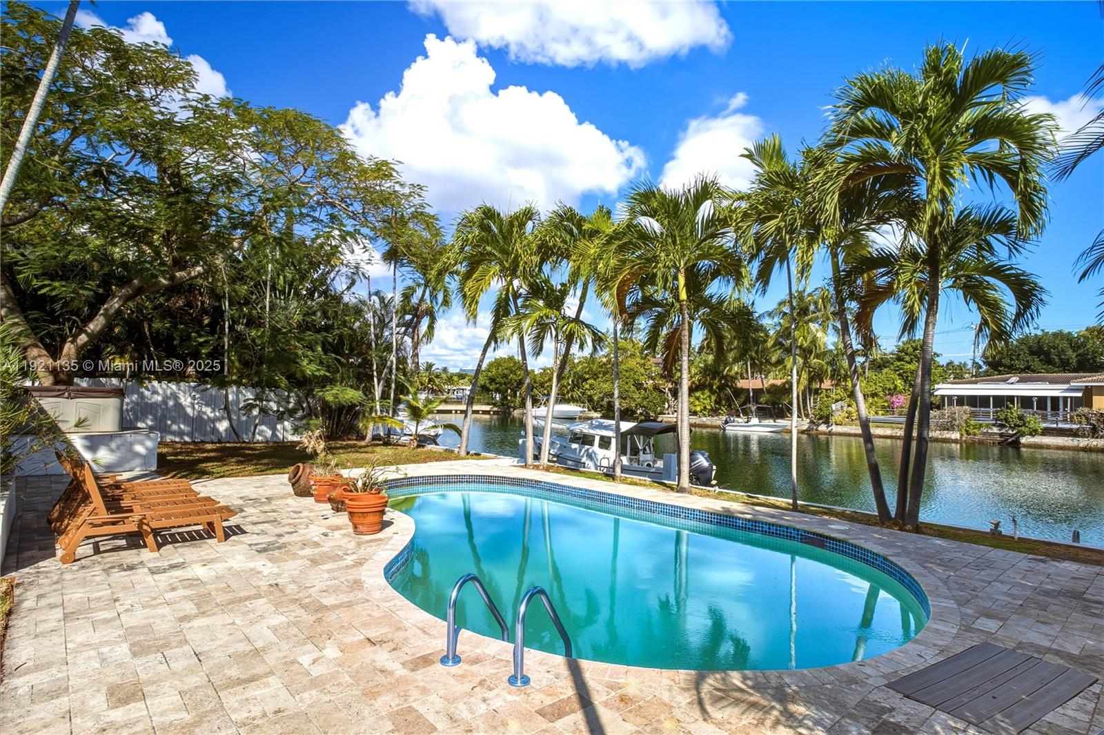 12545 Palm Road North Miami, FL 33181 - Photo 23 of 31 a view of swimming pool with chairs