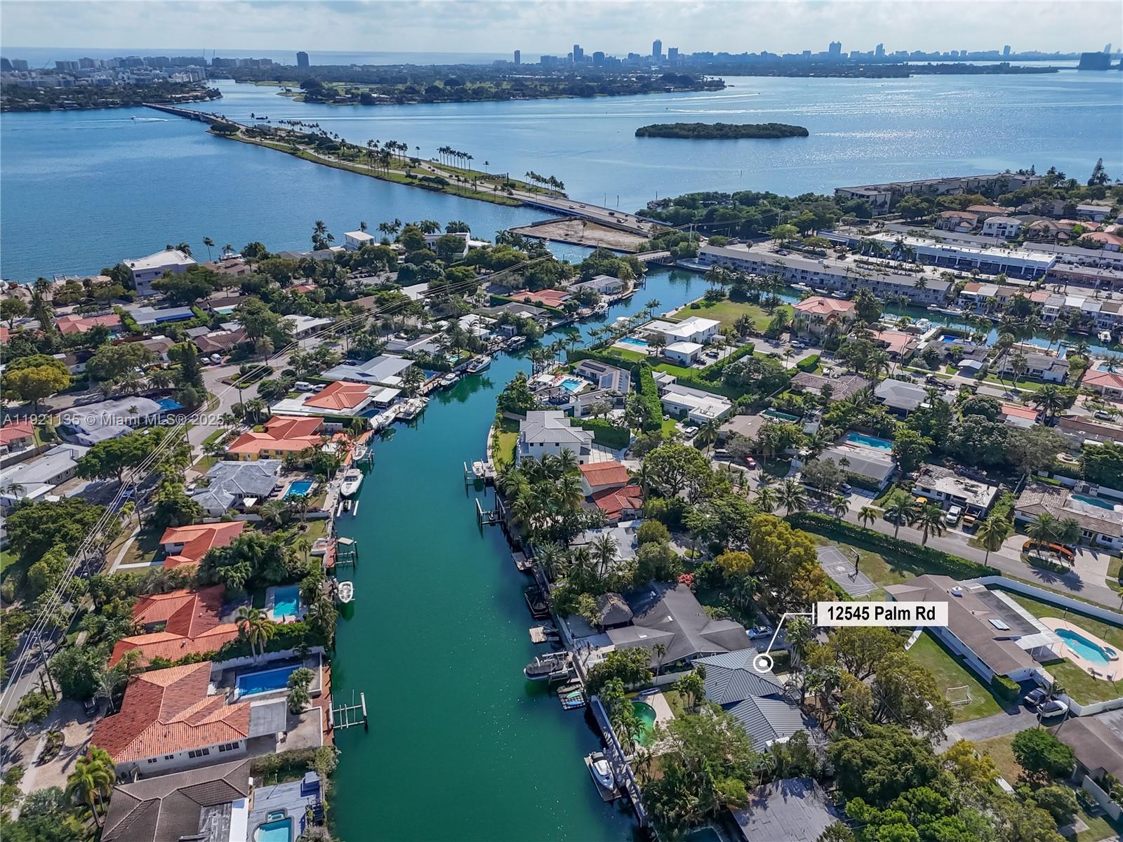 12545 Palm Road North Miami, FL 33181 - Photo 28 of 31 a view of a city and ocean view