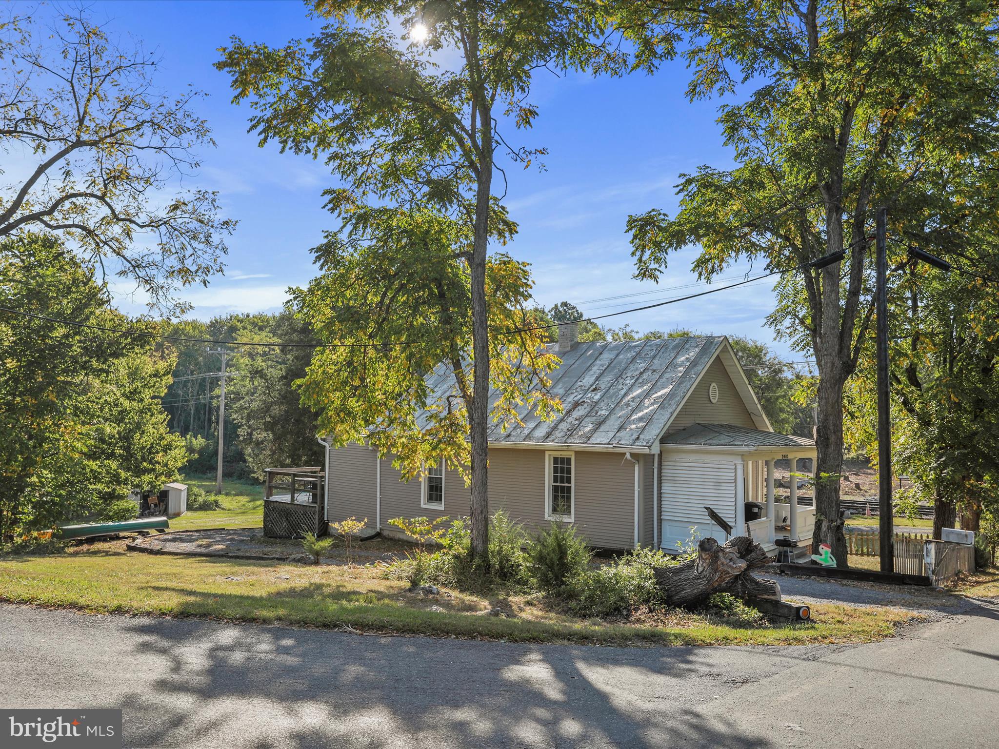 2085 Chapel Road Middletown, VA 22645 - Photo 4 of 19 a view of a house with garden and trees