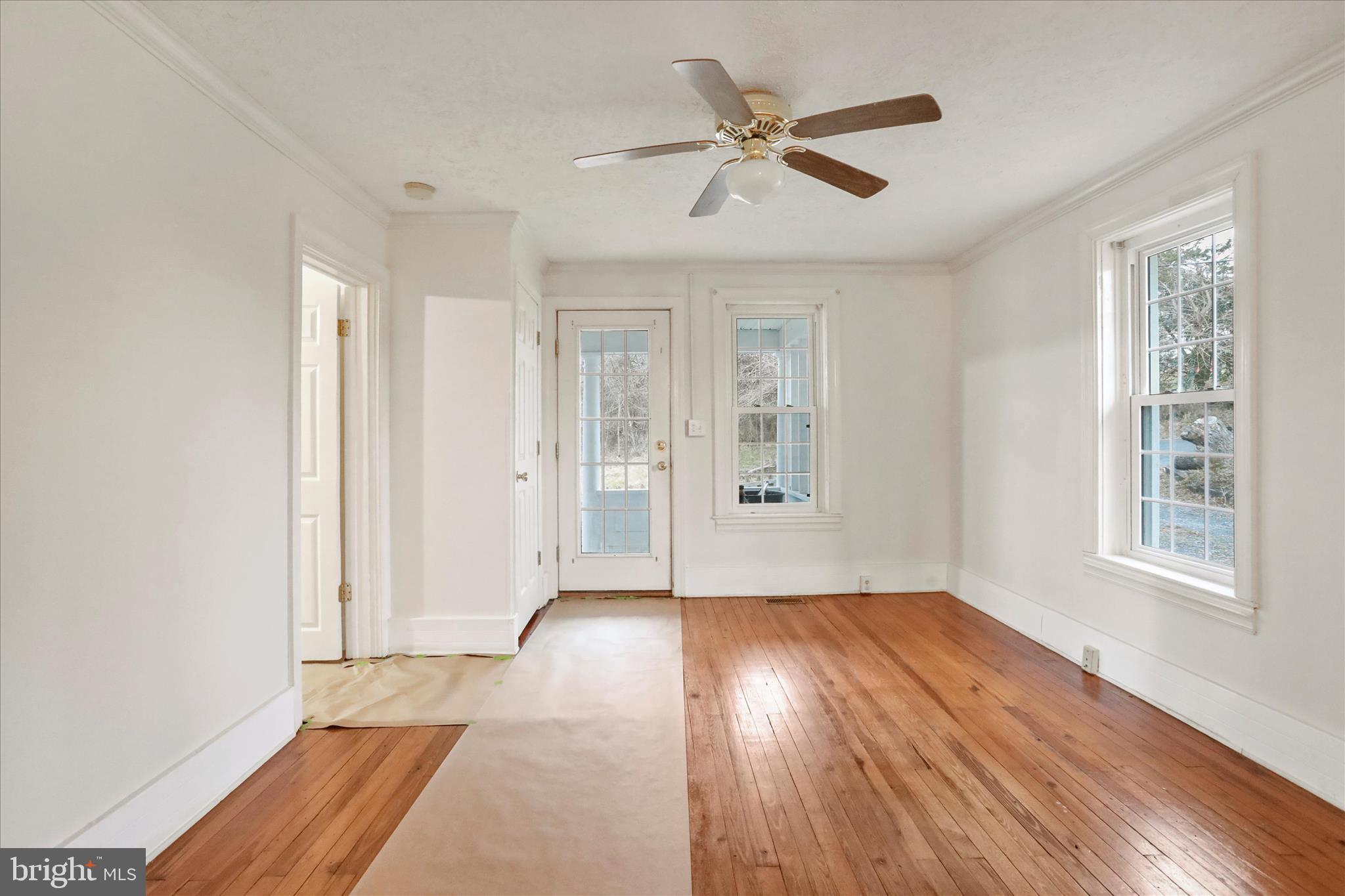 2085 Chapel Road Middletown, VA 22645 - Photo 5 of 19 wooden floor in an empty room with a window