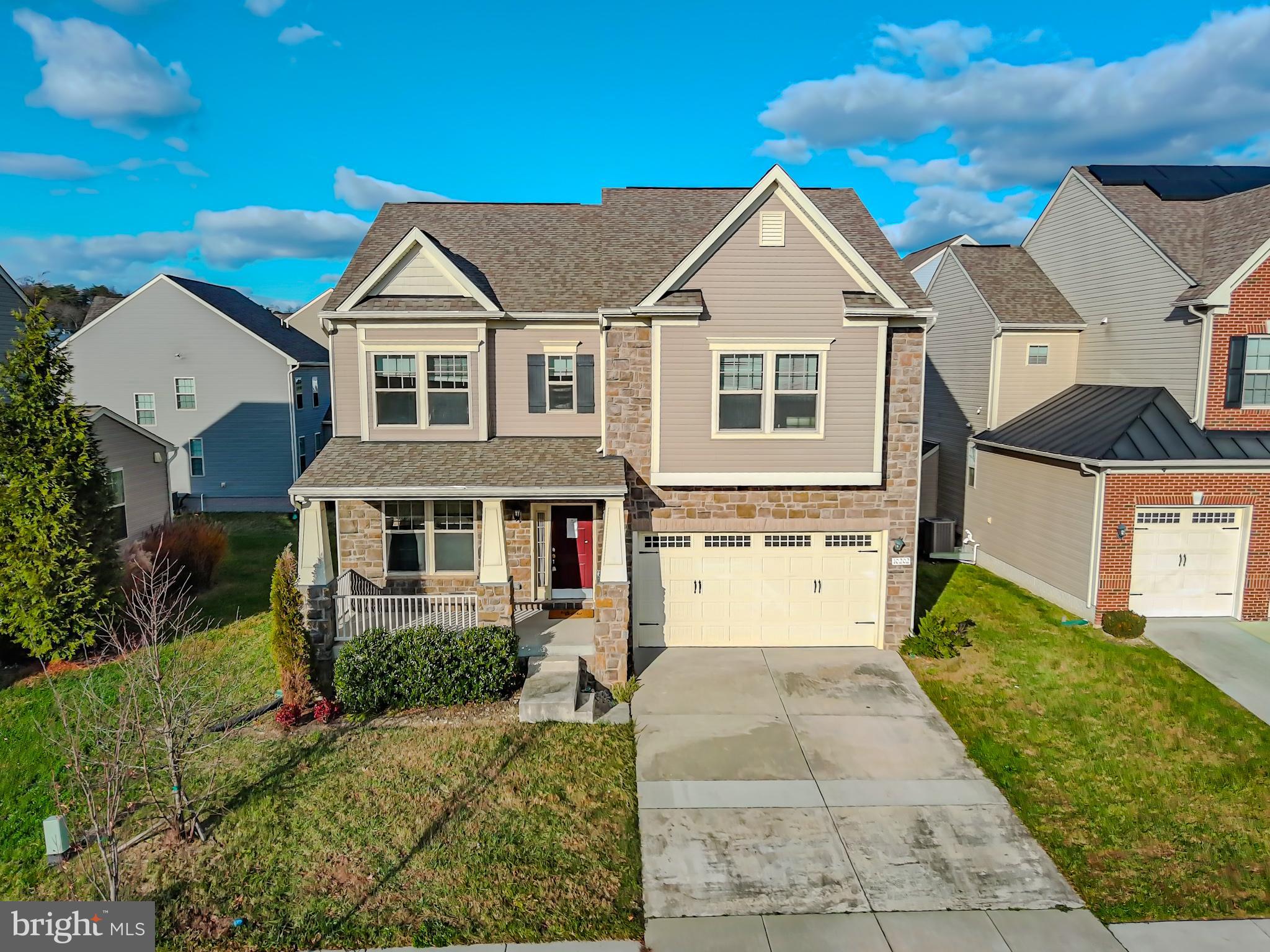 10202 Galaxy View Lane Lanham, MD 20706 - Photo 1 of 67 a front view of a house with a yard