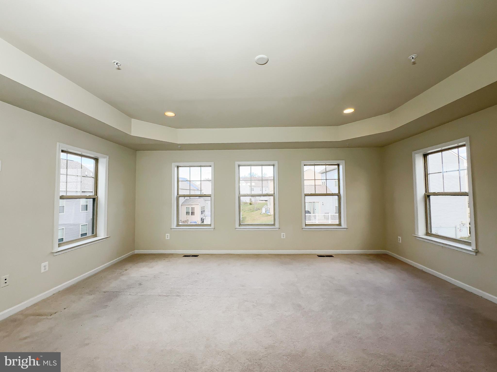 10202 Galaxy View Lane Lanham, MD 20706 - Photo 36 of 67 a view of an empty room with a window