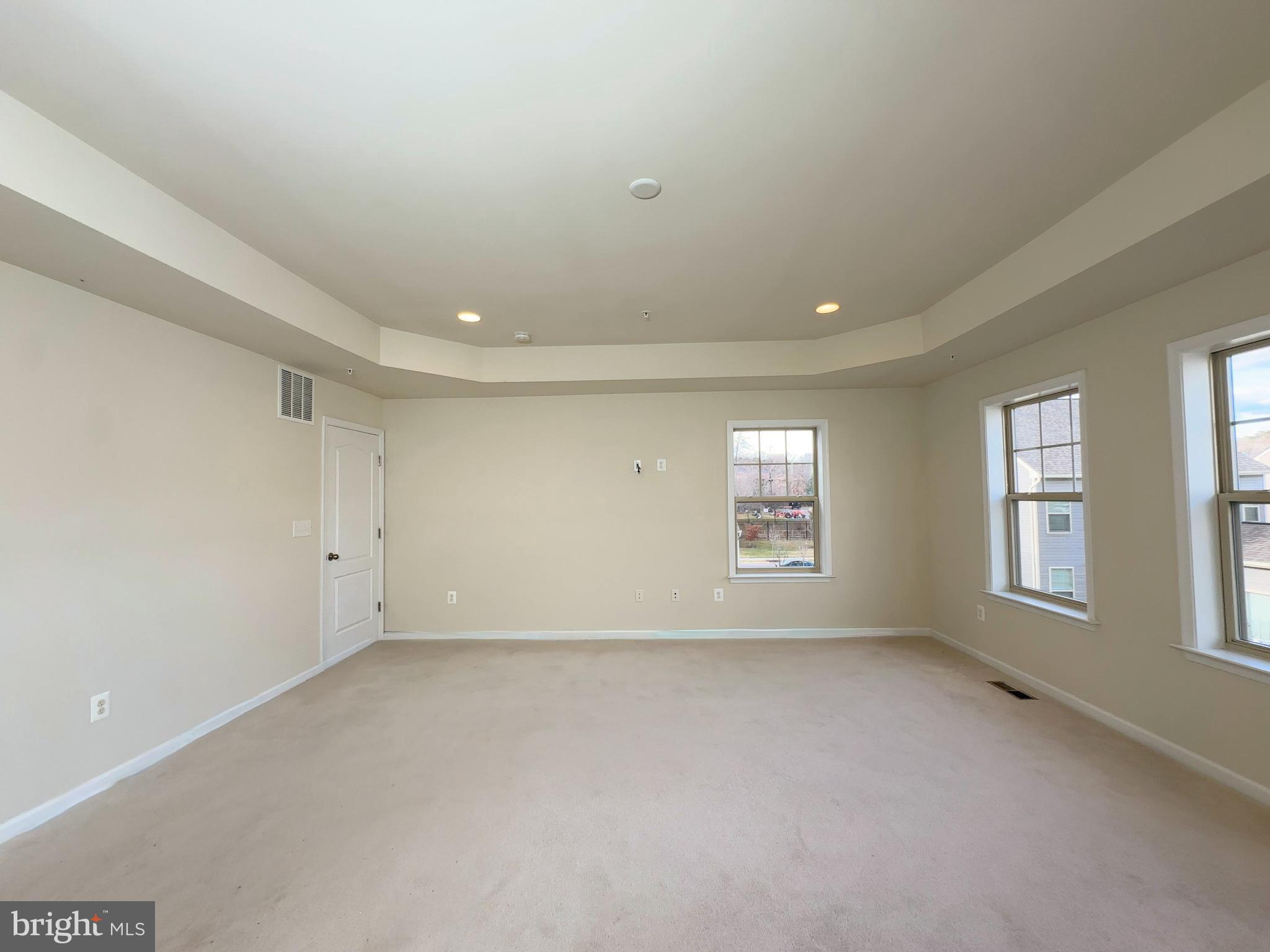 10202 Galaxy View Lane Lanham, MD 20706 - Photo 37 of 67 a view of an empty room with a window