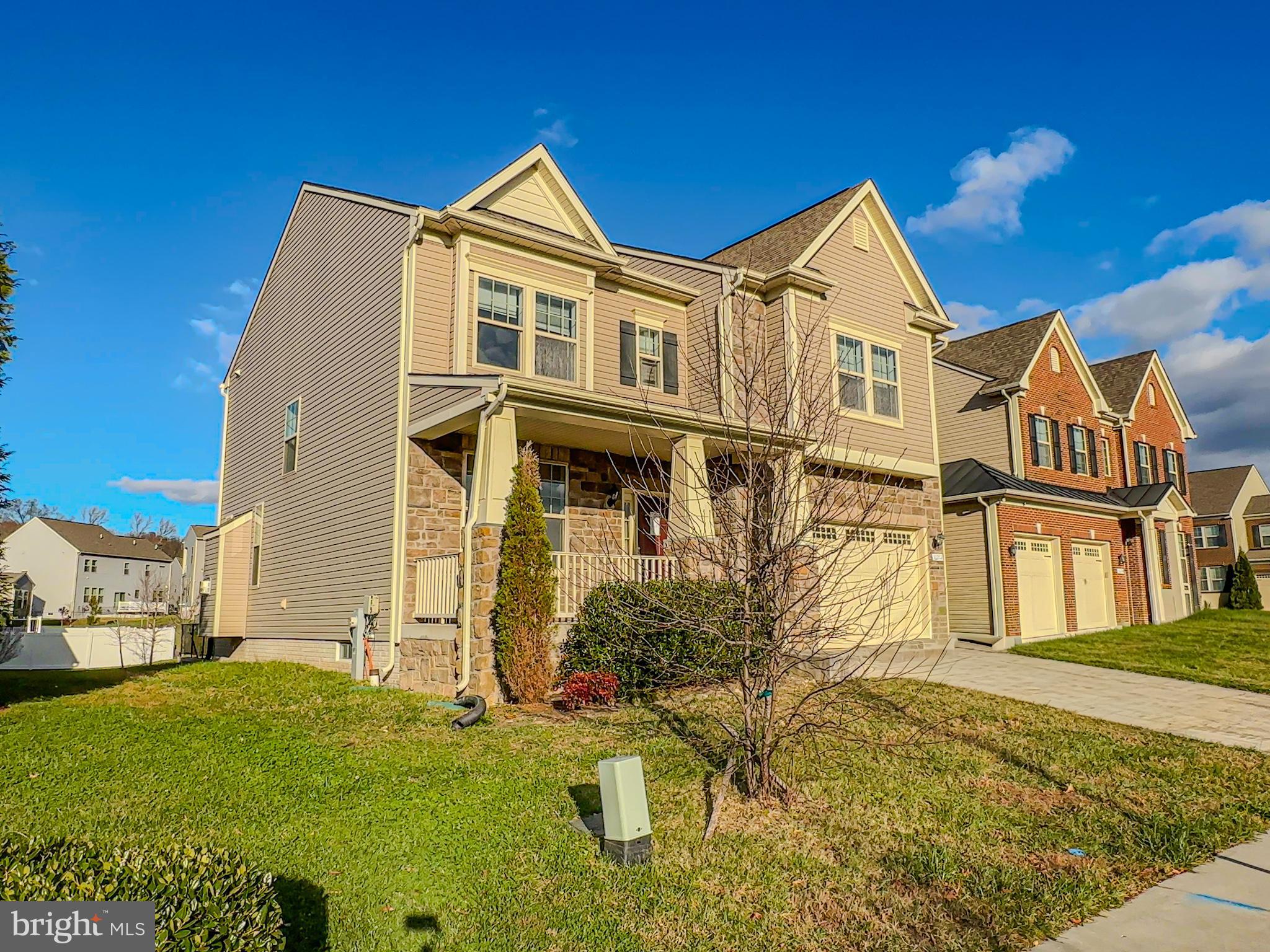 10202 Galaxy View Lane Lanham, MD 20706 - Photo 5 of 67 a front view of a house with a yard