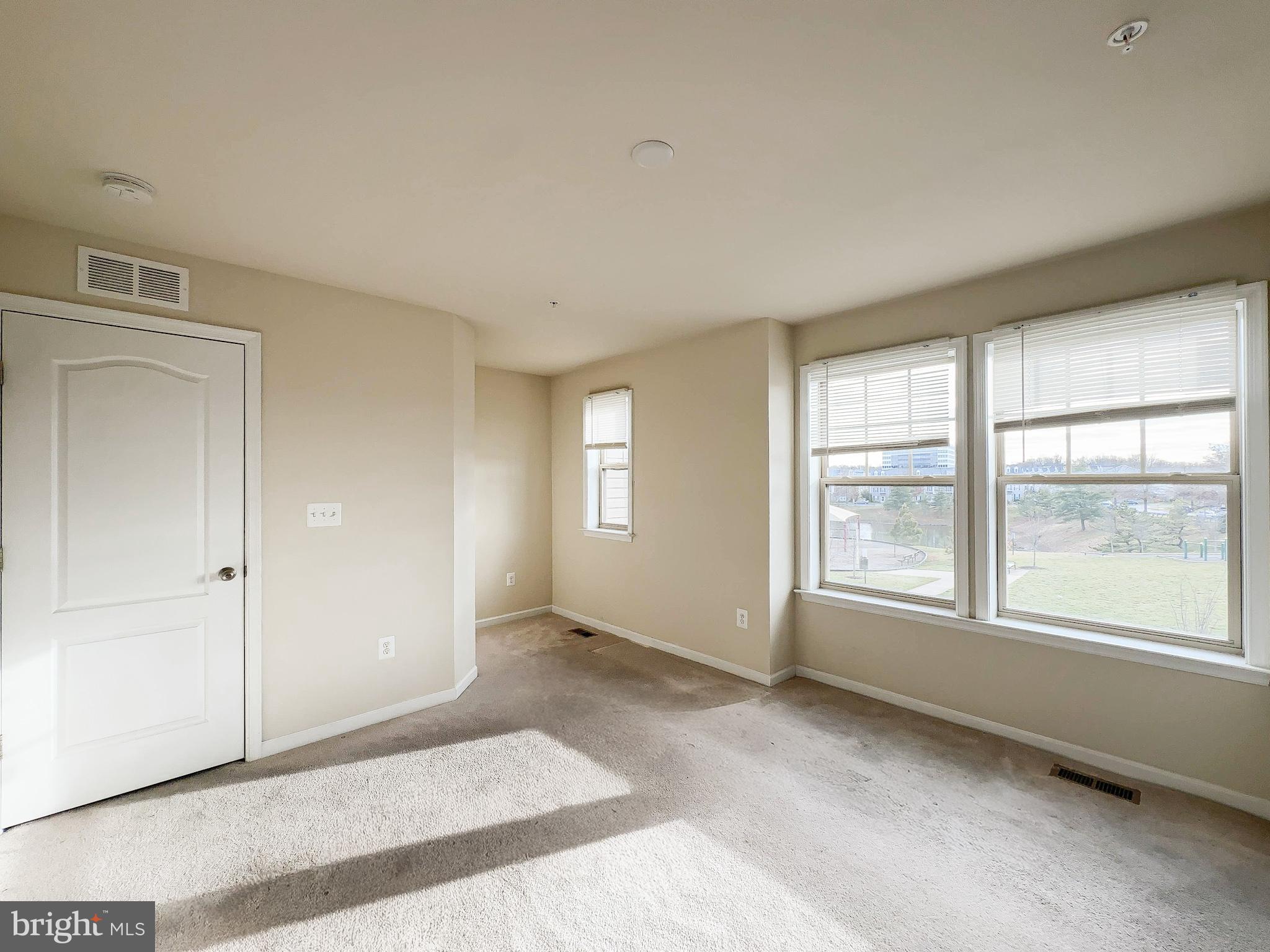 10202 Galaxy View Lane Lanham, MD 20706 - Photo 54 of 67 a view of an empty room with a window