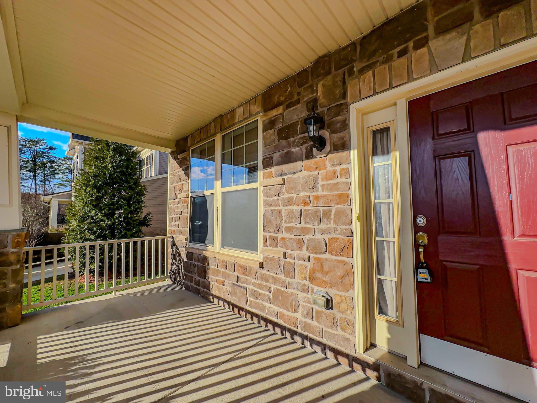 10202 Galaxy View Lane Lanham, MD 20706 - Photo 8 of 67 a view of a balcony with wooden floor