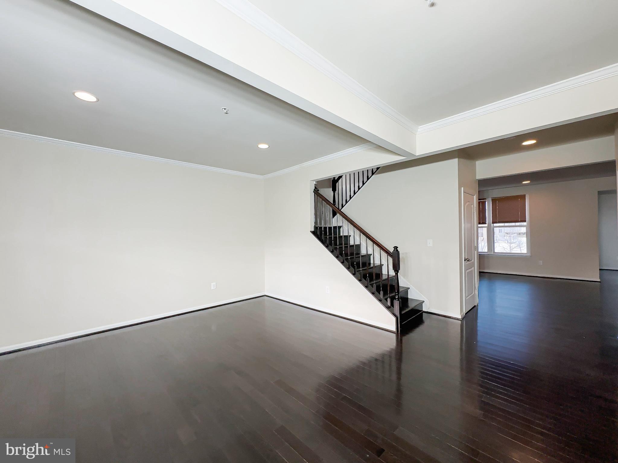 10202 Galaxy View Lane Lanham, MD 20706 - Photo 9 of 67 a view of entryway and hall with wooden floor