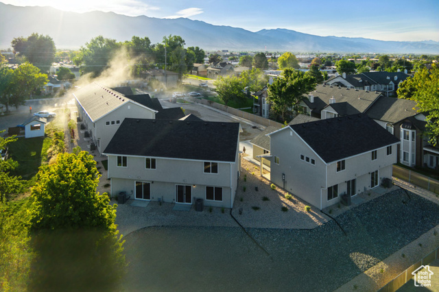 1615 North Angel Street, Unit I Layton, UT 84041 - Photo 32 of 56 Aerial perspective of suburban area featuring mountains