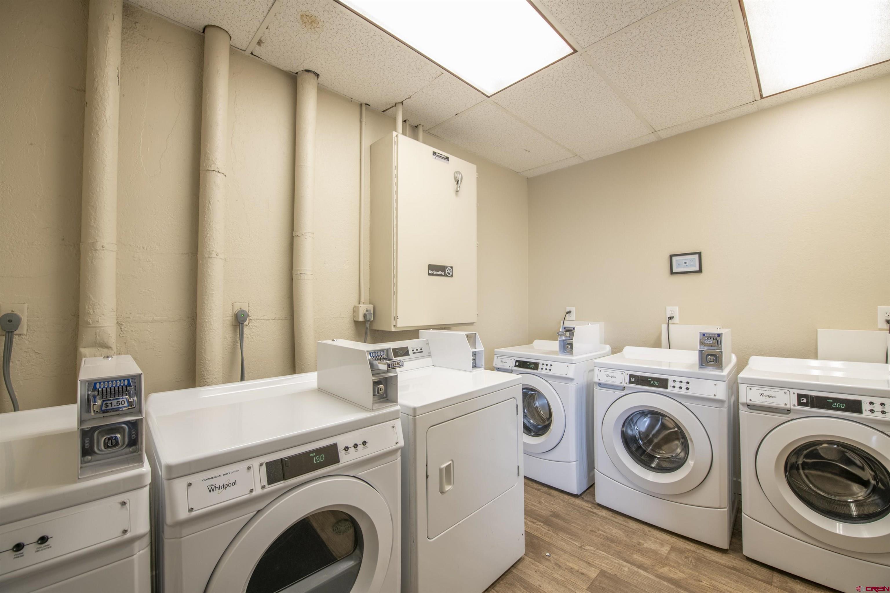 11 Emmons Road, Unit 430 Crested Butte, CO 81225 - Photo 22 of 27 a utility room with dryer and washer