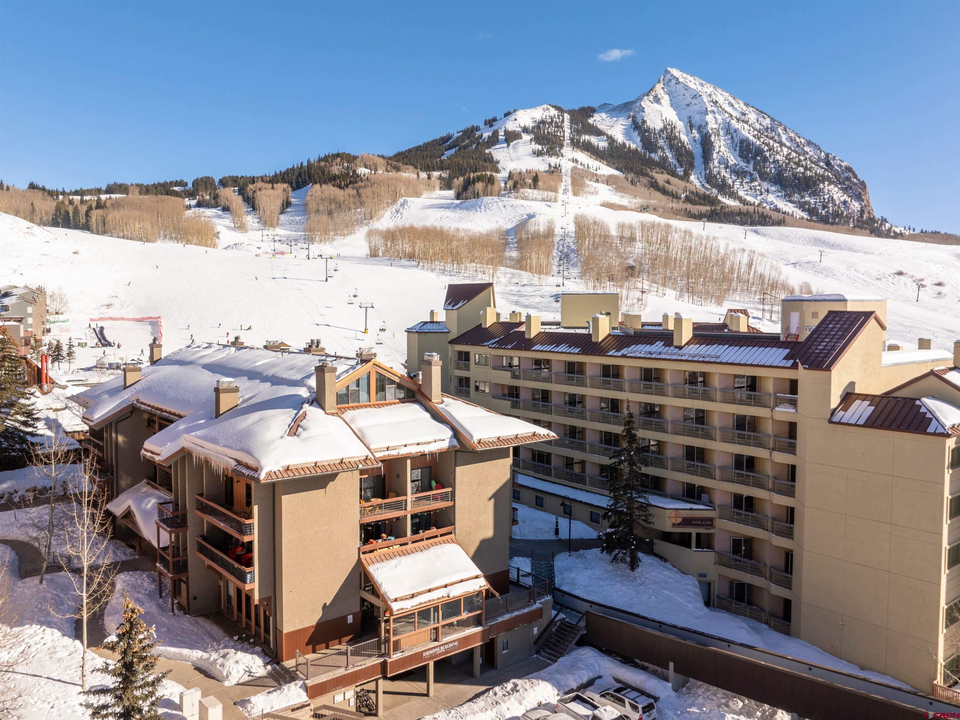 11 Emmons Road, Unit 430 Crested Butte, CO 81225 - Photo 24 of 27 a view of a buildings with a terrace