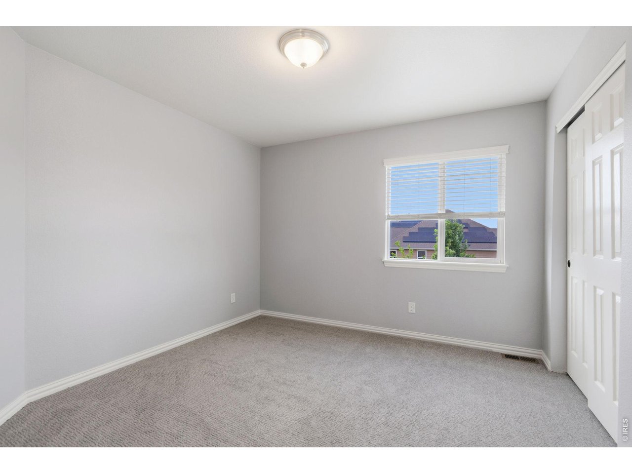 5751 Banner Street Timnath, CO 80547 - Photo 28 of 39 Upper bedroom 3