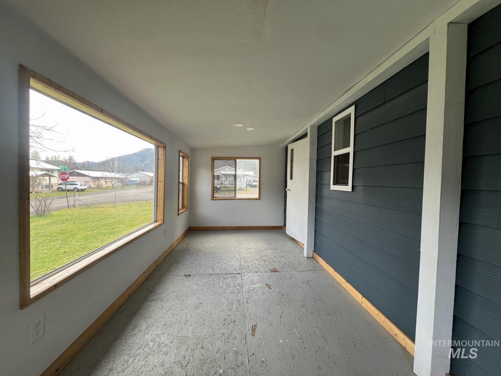 614 Pine Avenue Kooskia, ID 83539 - Photo 17 of 27 Unfurnished sunroom featuring vaulted ceiling