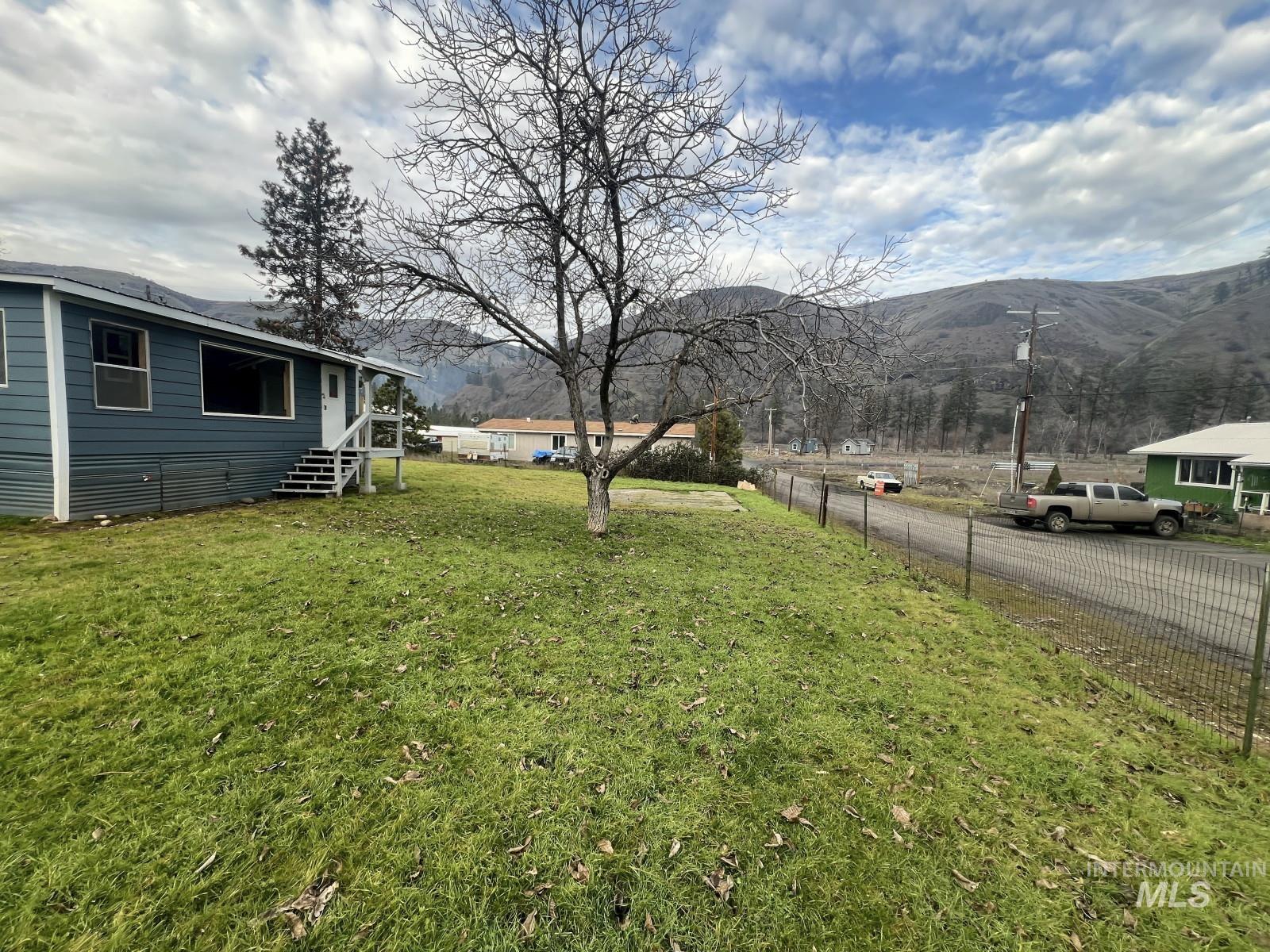 614 Pine Avenue Kooskia, ID 83539 - Photo 27 of 27 View of yard featuring a mountain view