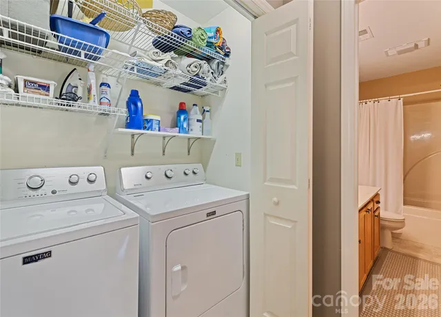 a utility room with dryer and washer