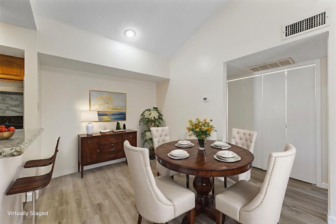 9221 Imogene Street, Unit 9221 Houston, TX 77036 - Photo 11 of 19 a view of a dining room with furniture
