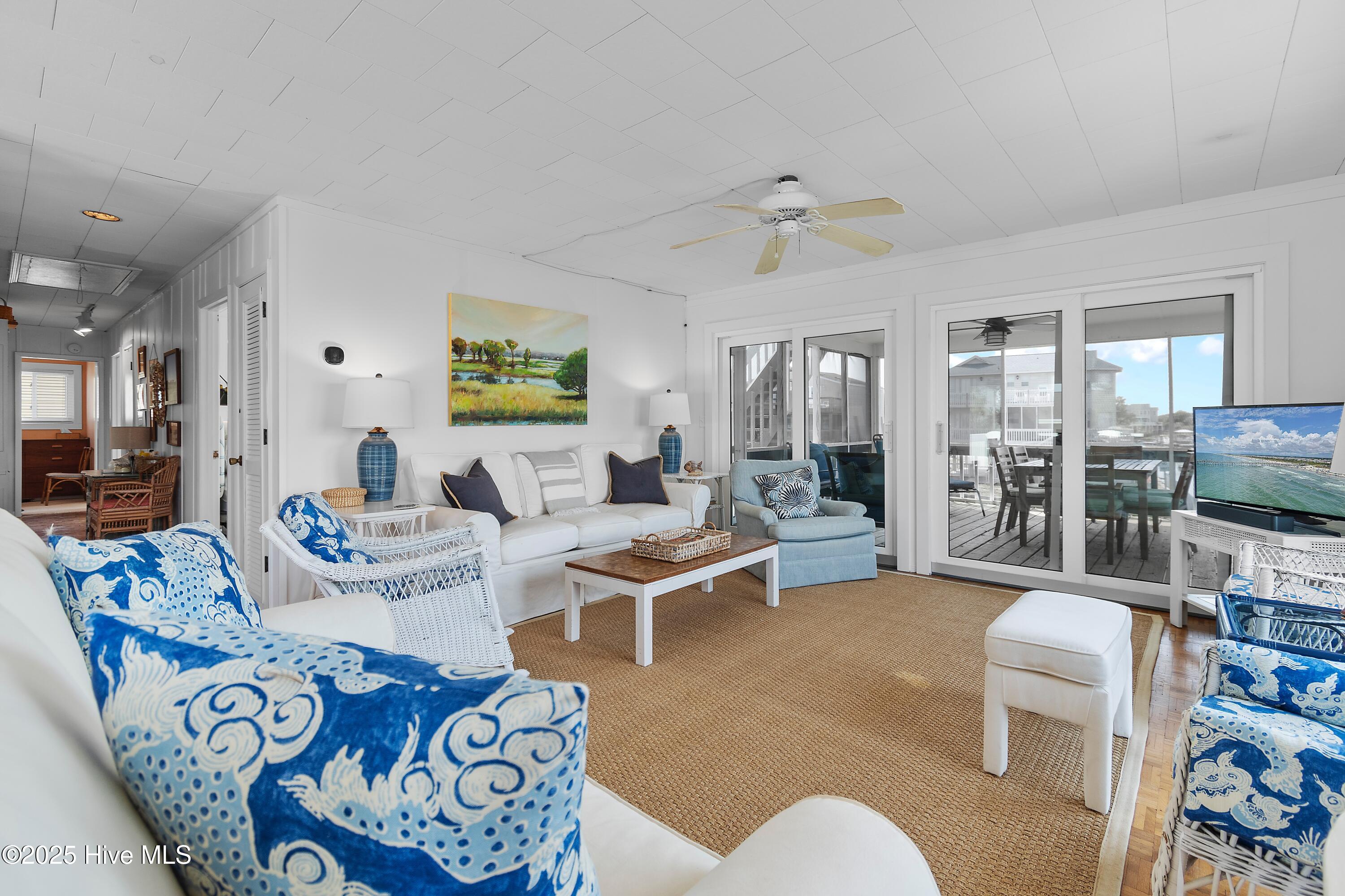 402 Dolphin Street Sunset Beach, NC 28468 - Photo 18 of 53 Stylish & Inviting Living Area