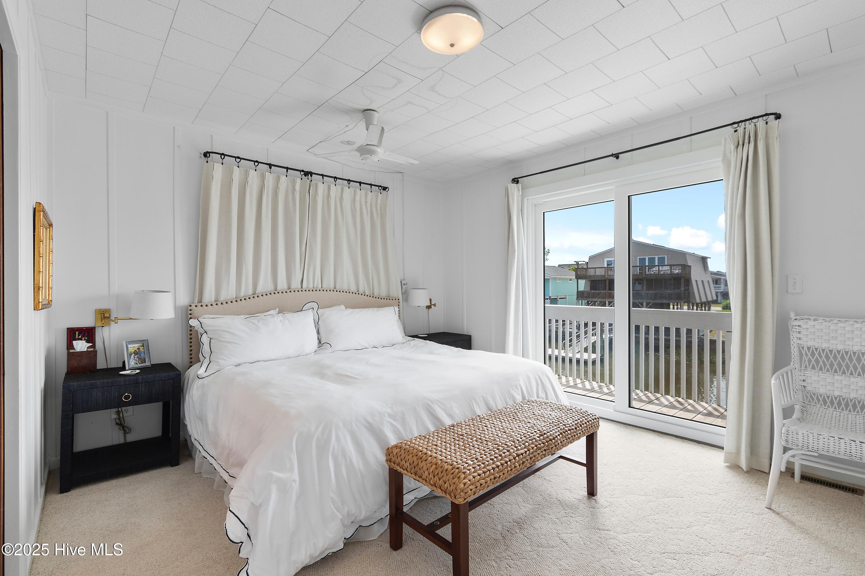 402 Dolphin Street Sunset Beach, NC 28468 - Photo 31 of 53 Bedroom with Porch Access