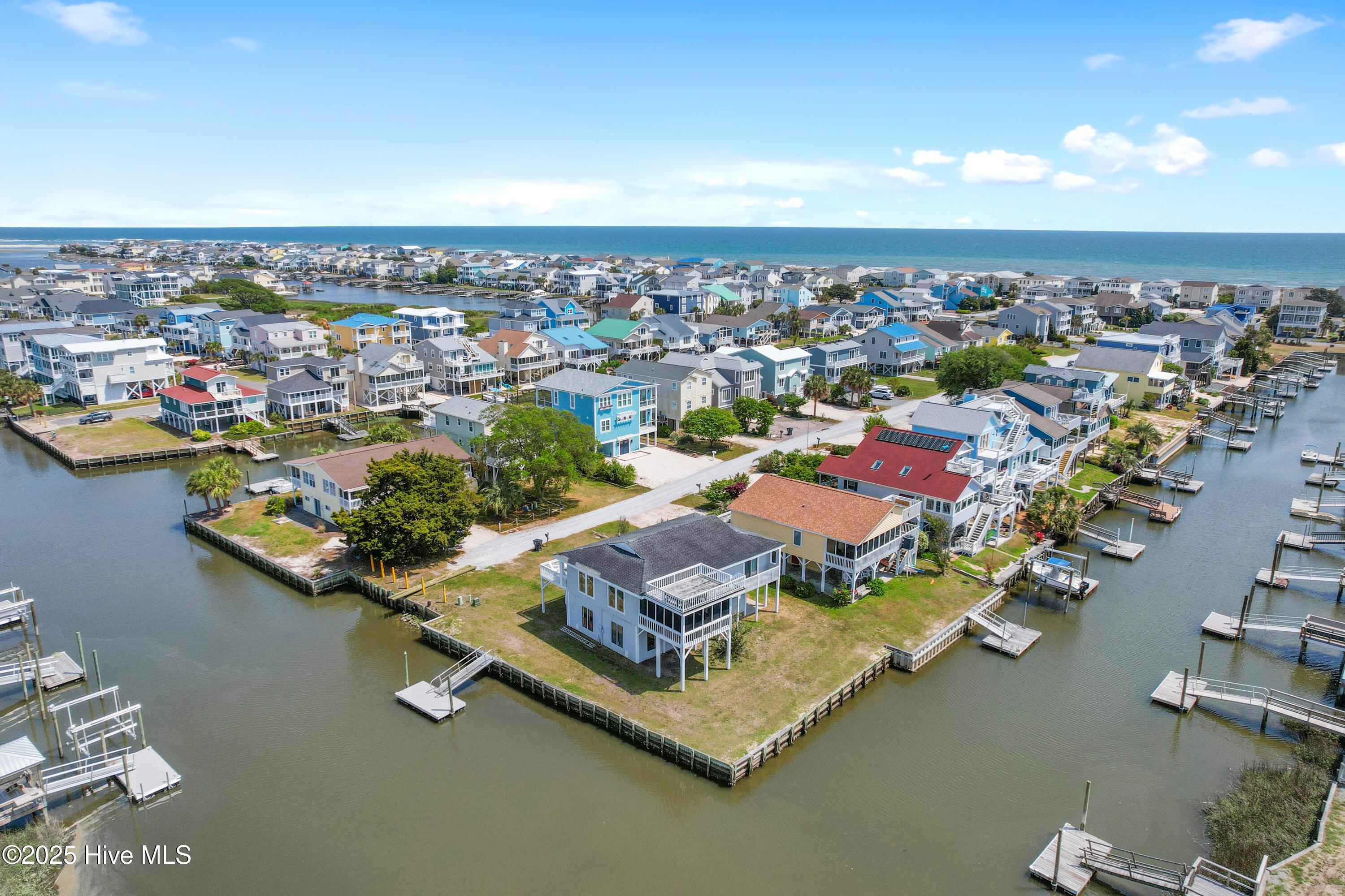 402 Dolphin Street Sunset Beach, NC 28468 - Photo 4 of 53 Waterfront Home on 2 sides