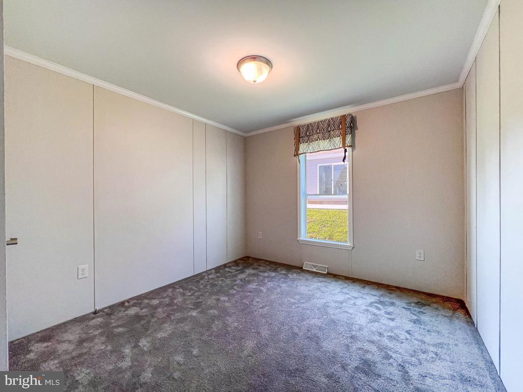 141 Minch Road Parkesburg, PA 19365 - Photo 18 of 34 an empty room with window