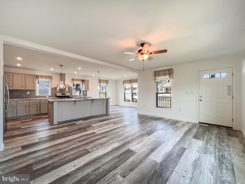 141 Minch Road Parkesburg, PA 19365 - Photo 25 of 34 a view of kitchen and hall with wooden floor