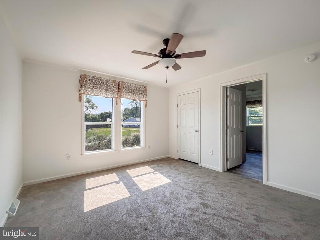 141 Minch Road Parkesburg, PA 19365 - Photo 30 of 34 a view of an empty room with a window
