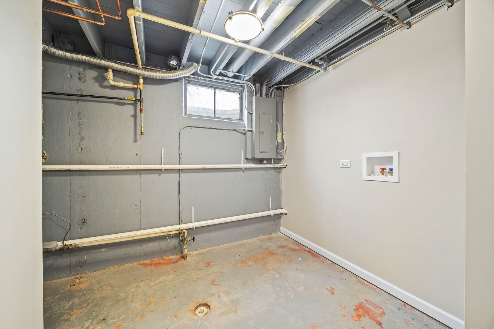 246 Miller Avenue DeKalb, IL 60115 - Photo 27 of 36 a view of a room with racks on the wall