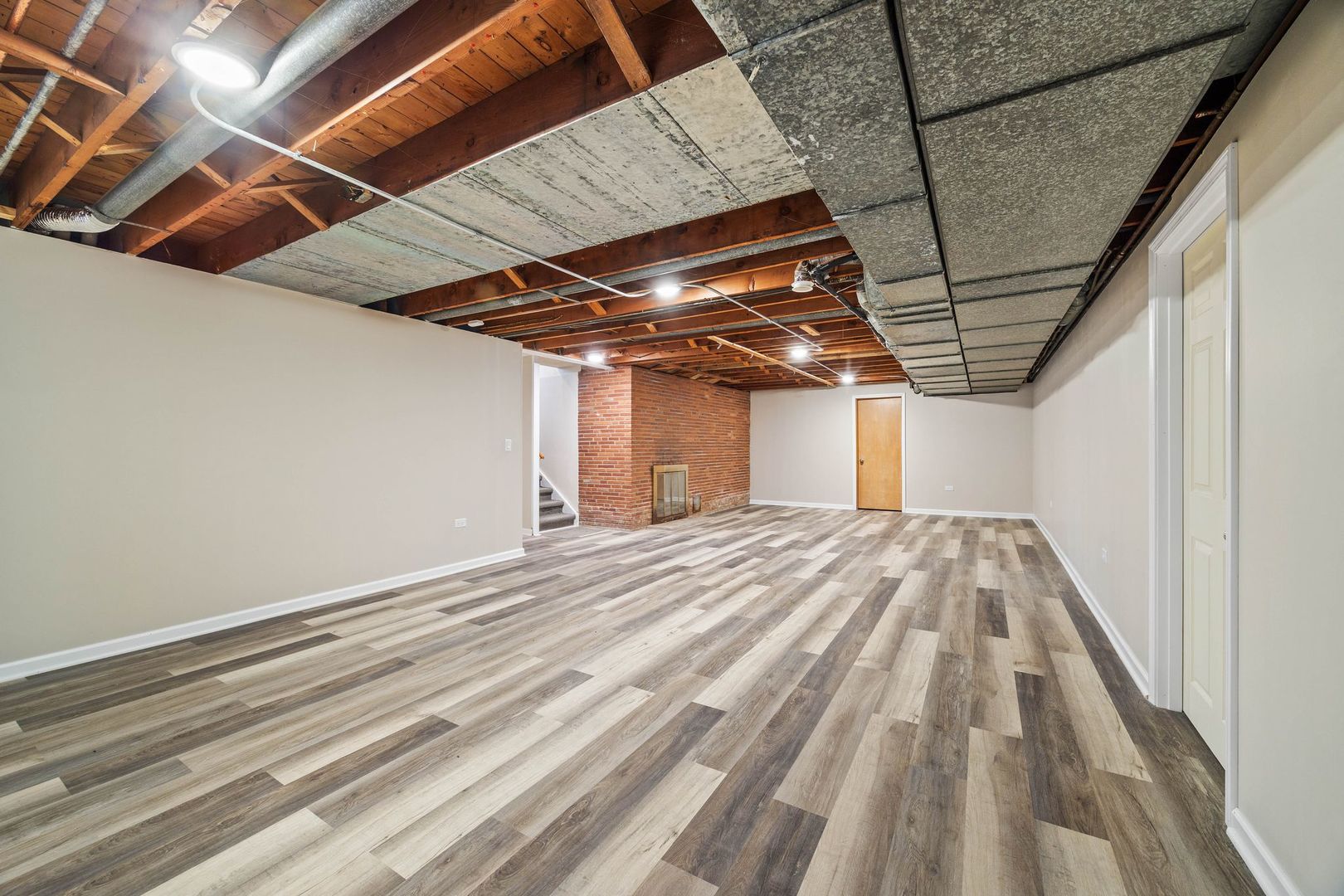 246 Miller Avenue DeKalb, IL 60115 - Photo 29 of 36 a view of a room with wooden floor