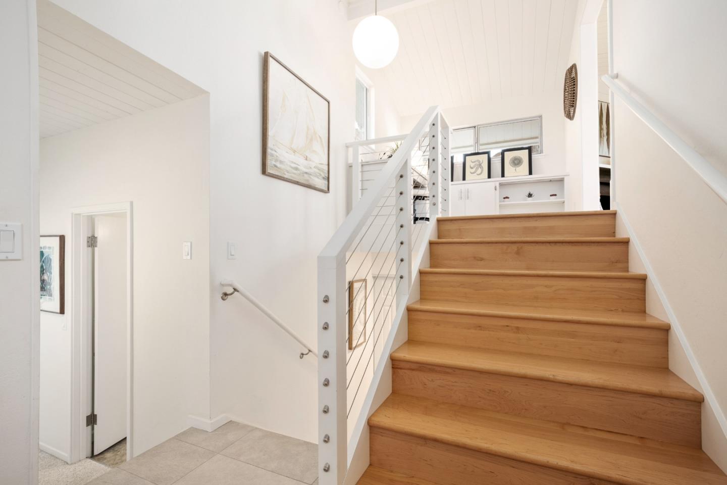 404 Arbolado Drive La Selva Beach, CA 95076 - Photo 16 of 36 a view of staircase with white walls and white walls