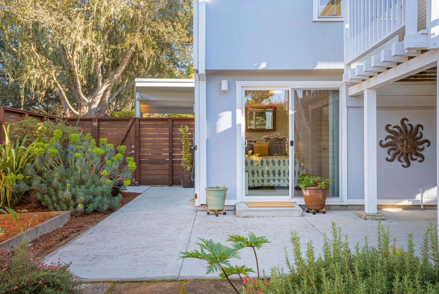 404 Arbolado Drive La Selva Beach, CA 95076 - Photo 26 of 36 a front view of a house with garden