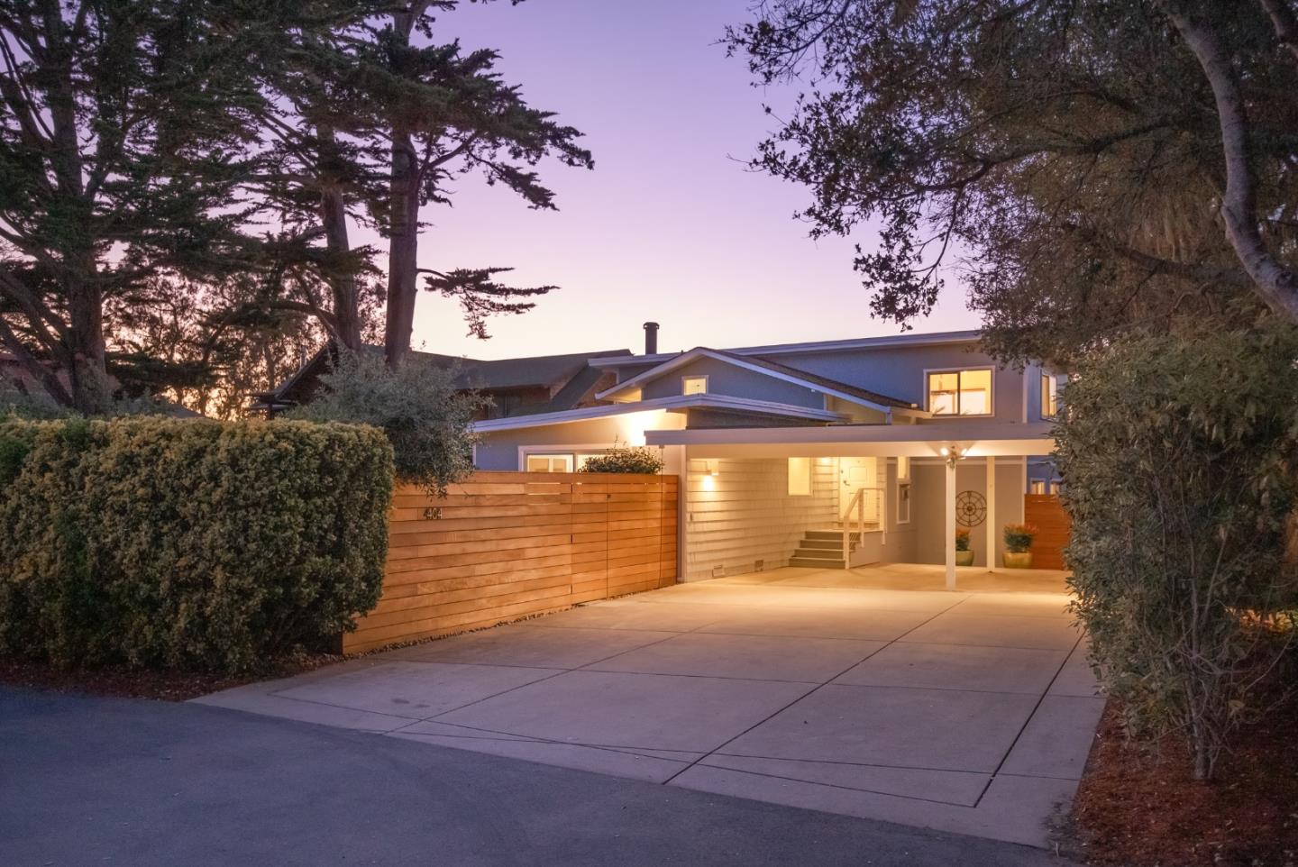 404 Arbolado Drive La Selva Beach, CA 95076 - Photo 3 of 36 a front view of a house with a yard