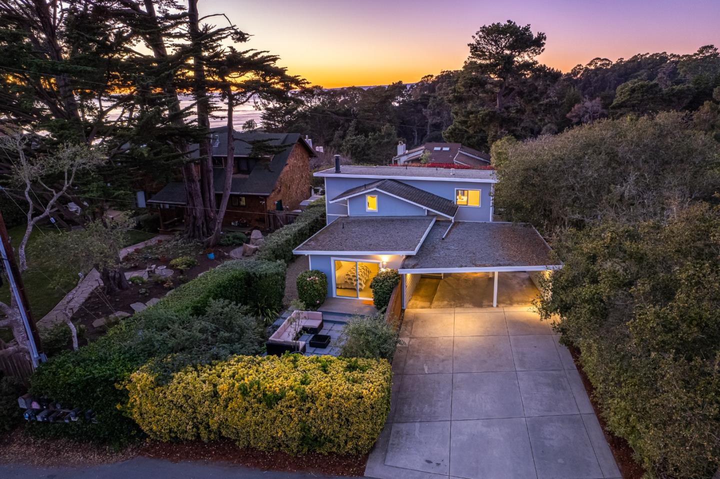 404 Arbolado Drive La Selva Beach, CA 95076 - Photo 31 of 36 a aerial view of a house with swimming pool and large trees