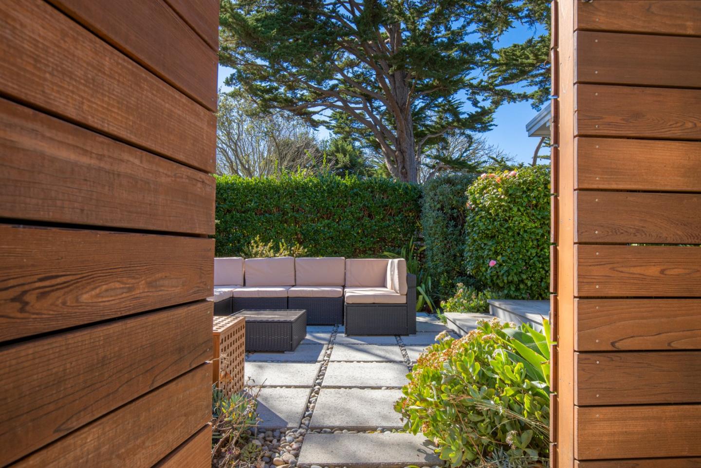 404 Arbolado Drive La Selva Beach, CA 95076 - Photo 5 of 36 a view of backyard with outdoor seating and plants