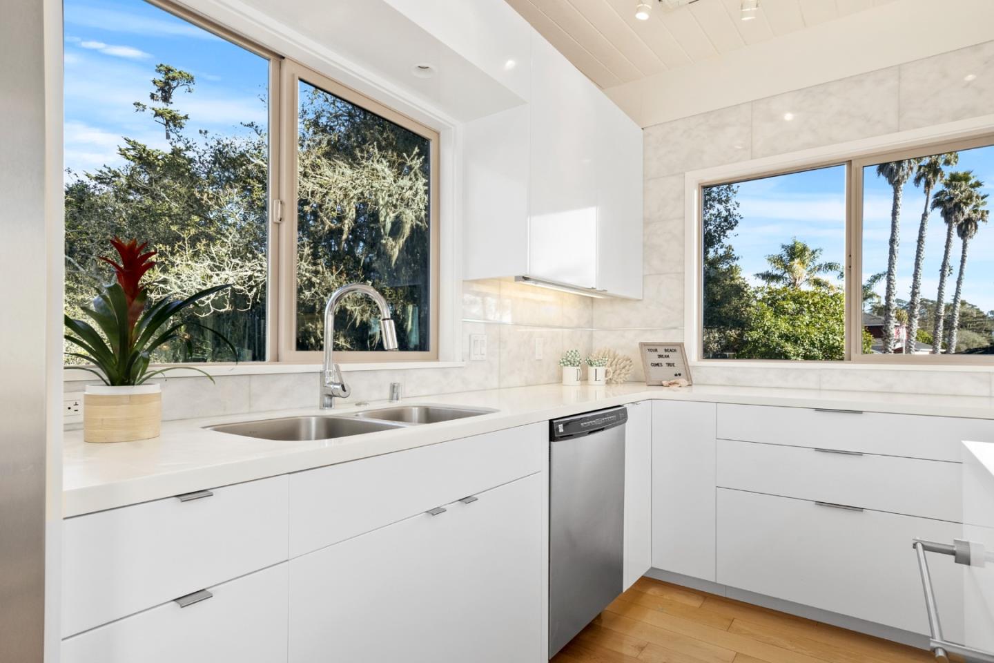404 Arbolado Drive La Selva Beach, CA 95076 - Photo 8 of 36 a kitchen with a sink and large window