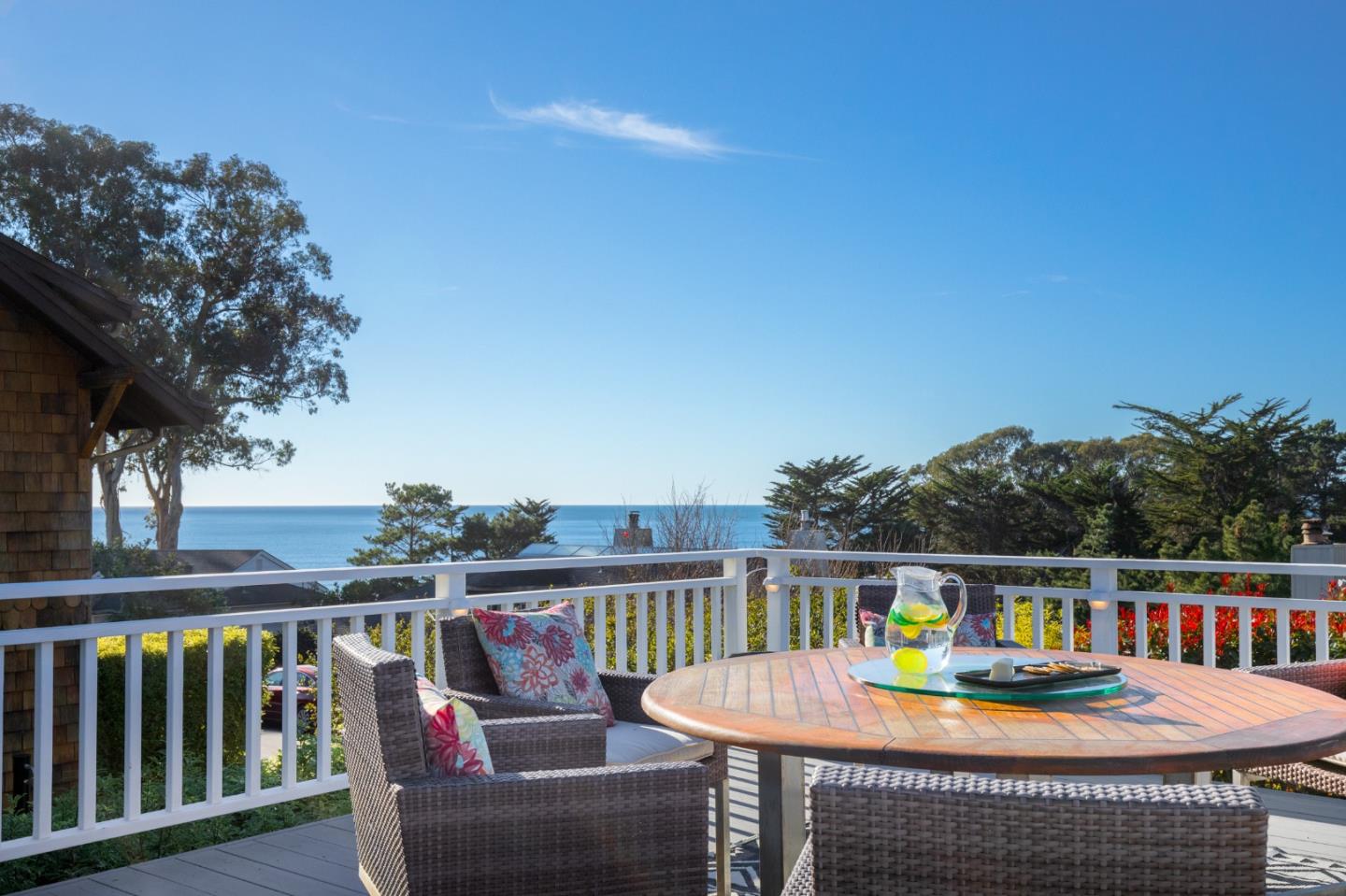 404 Arbolado Drive La Selva Beach, CA 95076 - Photo 10 of 36 a view of a chairs and table on the deck