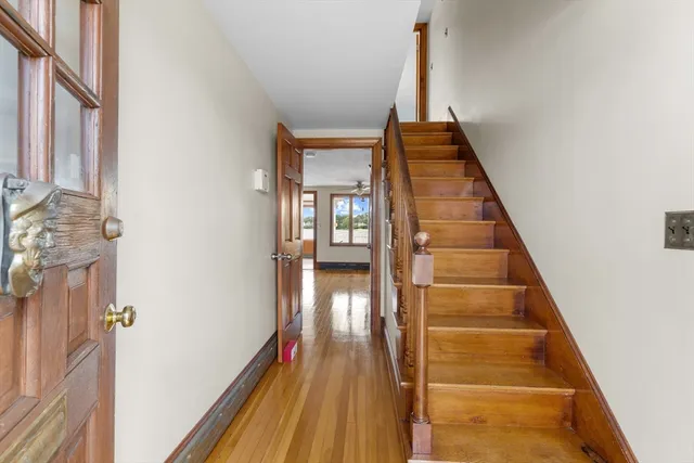 a utility room with cabinets dryer and washer