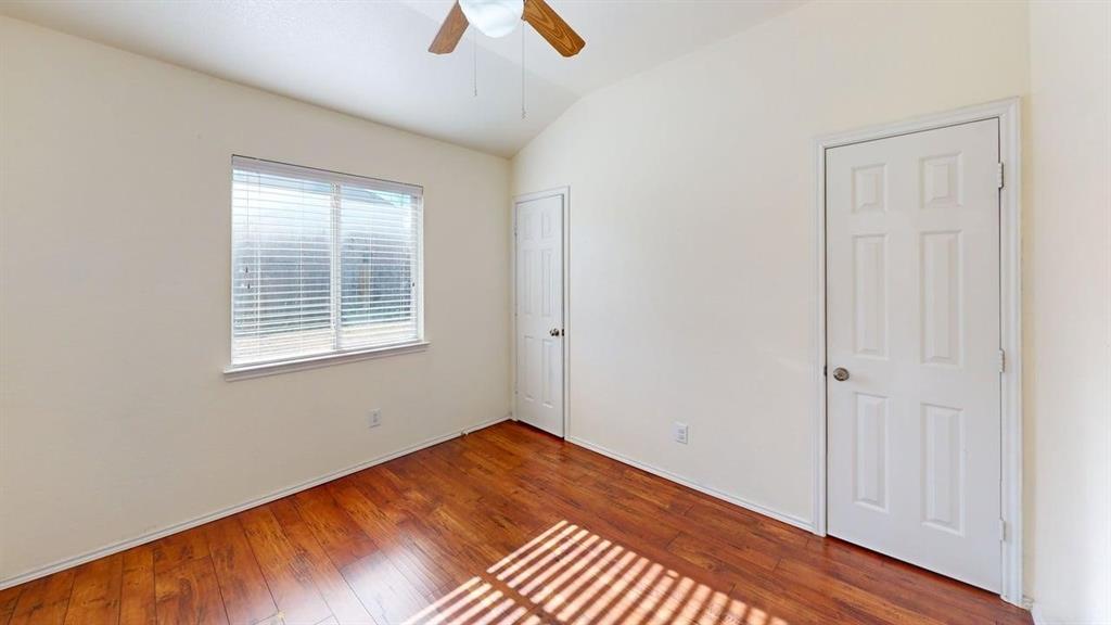 3251 Torio Grand Prairie, TX 75054 - Photo 16 of 23 wooden floor in an empty room with a window