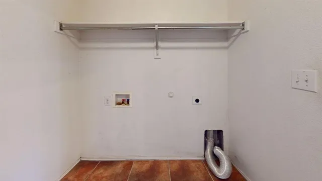 a view of a small space with racks on the wall