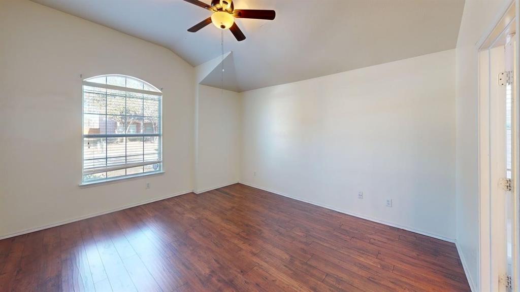3251 Torio Grand Prairie, TX 75054 - Photo 10 of 23 wooden floor in an empty room with a window