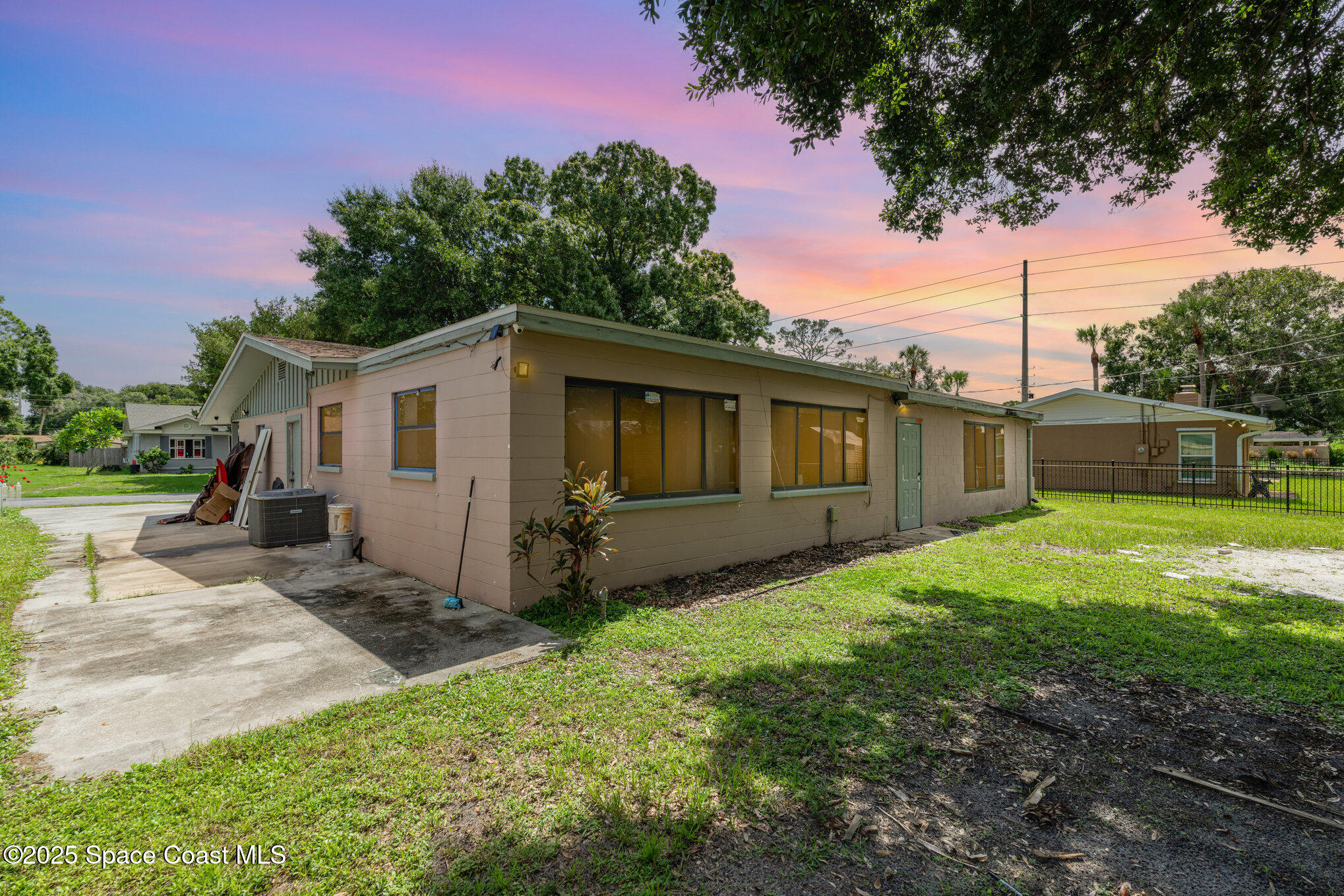 935 South Varr Avenue Rockledge, FL 32955 - Photo 24 of 29 a view of a house with backyard and garden