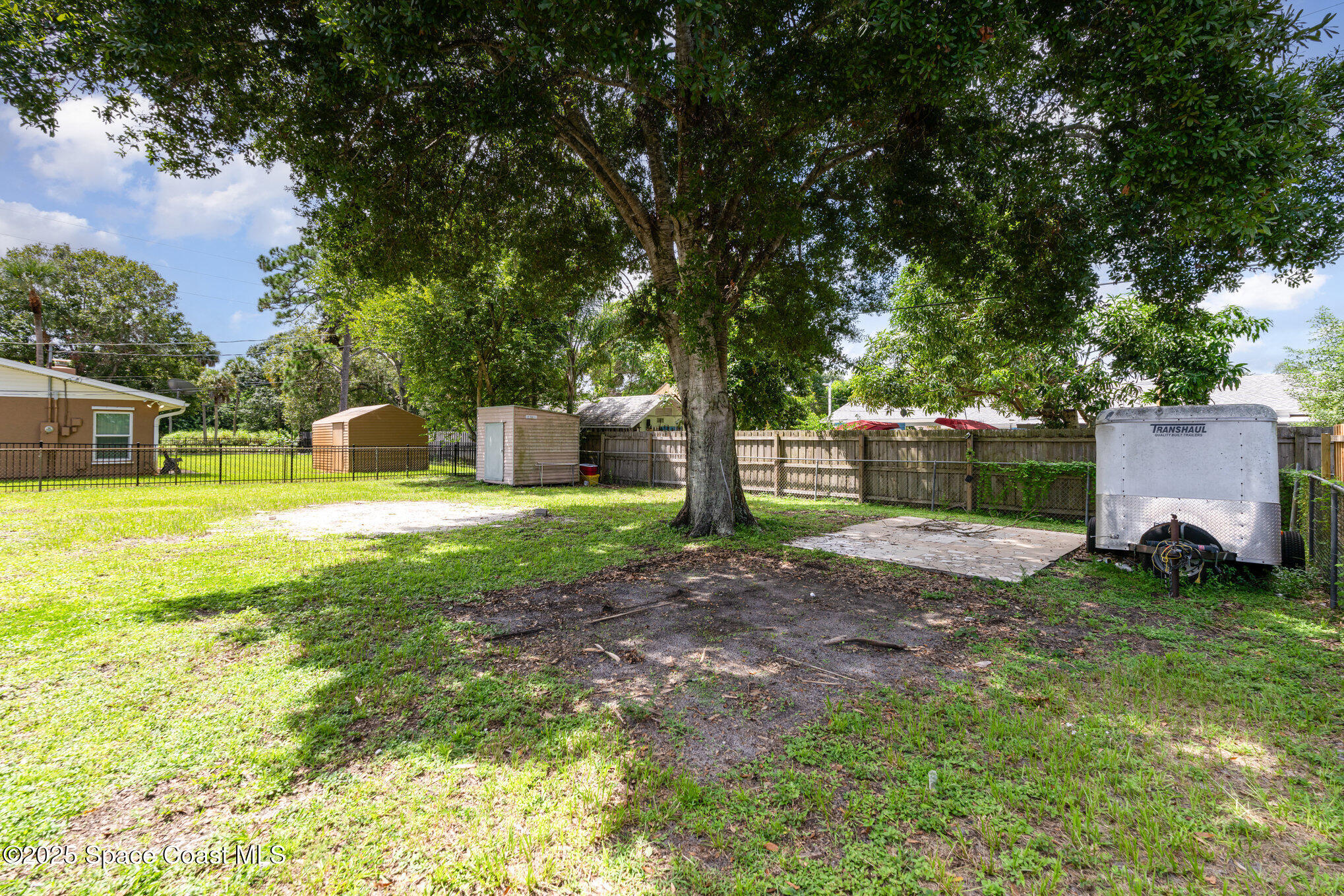 935 South Varr Avenue Rockledge, FL 32955 - Photo 25 of 29 a view of a backyard with swimming pool