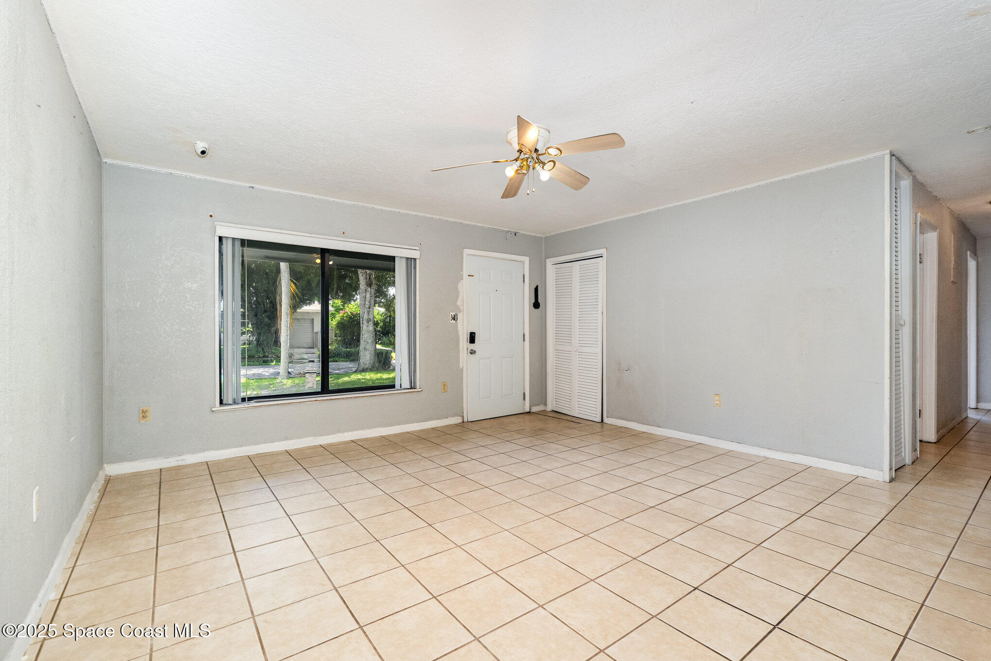 935 South Varr Avenue Rockledge, FL 32955 - Photo 5 of 29 a view of an empty room with window