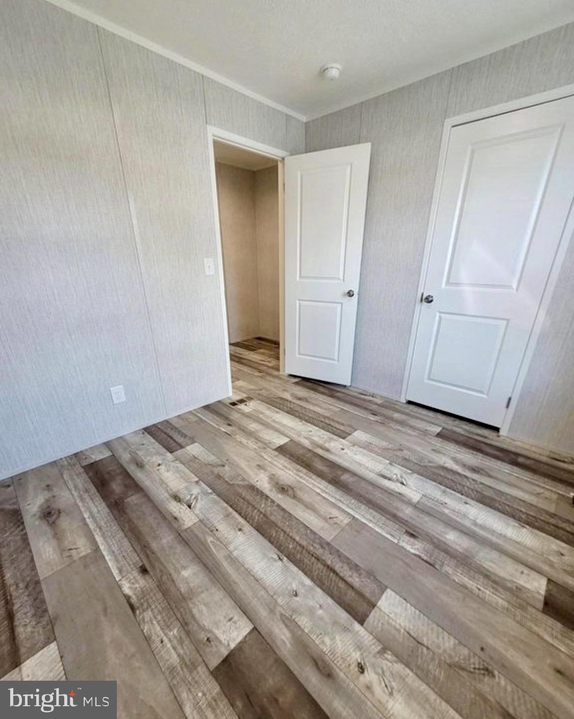 47 Hilltop Avenue Akron, PA 17501 - Photo 25 of 29 a view of a closet area with wooden floor