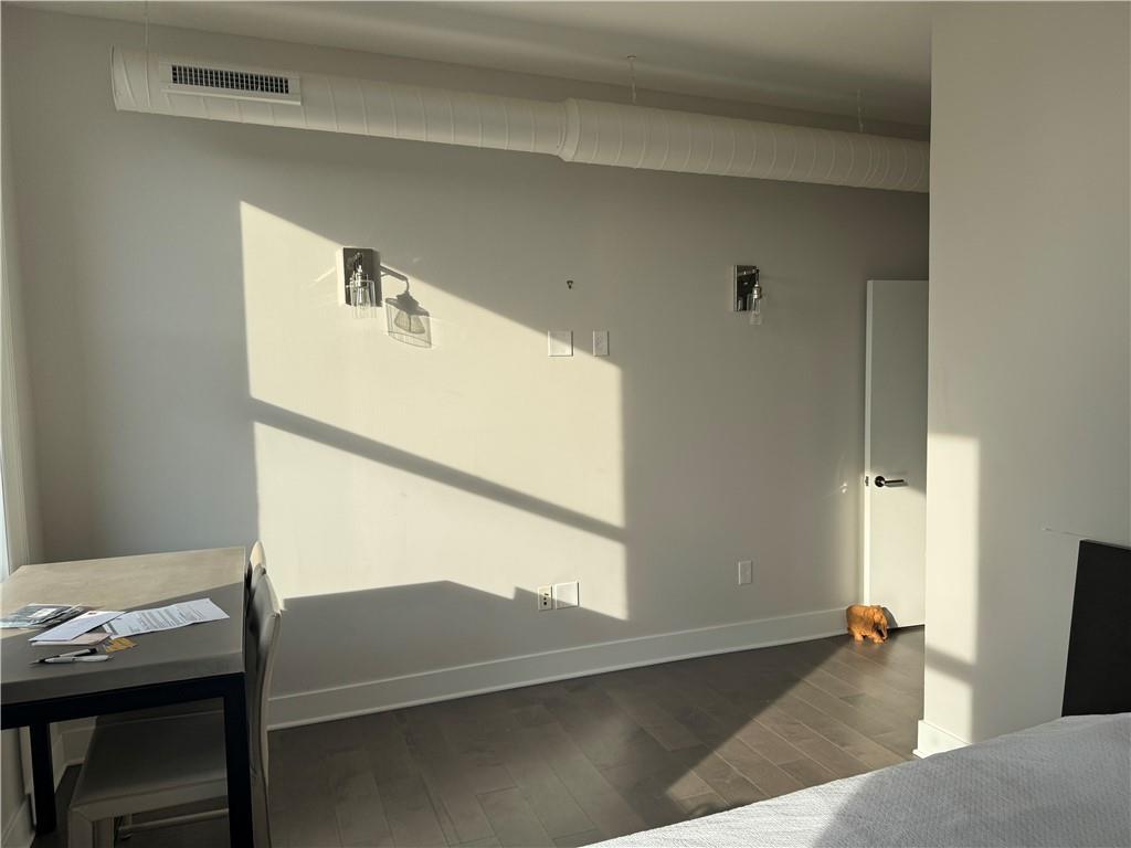 306 Fourth Avenue, Unit 1602 Pittsburgh, PA 15222 - Photo 17 of 31 a view of a hallway with furniture and a window