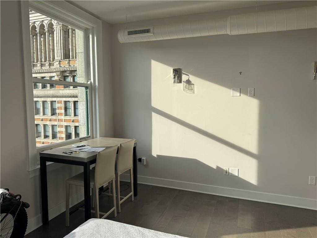 306 Fourth Avenue, Unit 1602 Pittsburgh, PA 15222 - Photo 18 of 31 a dining room with furniture and window